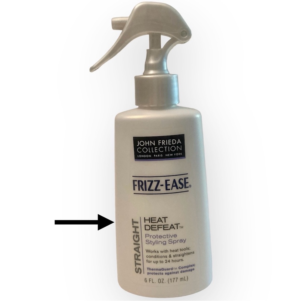 50% full John Frieda Frizz Ease Straight Heat Defeat Protective Styling Spray
